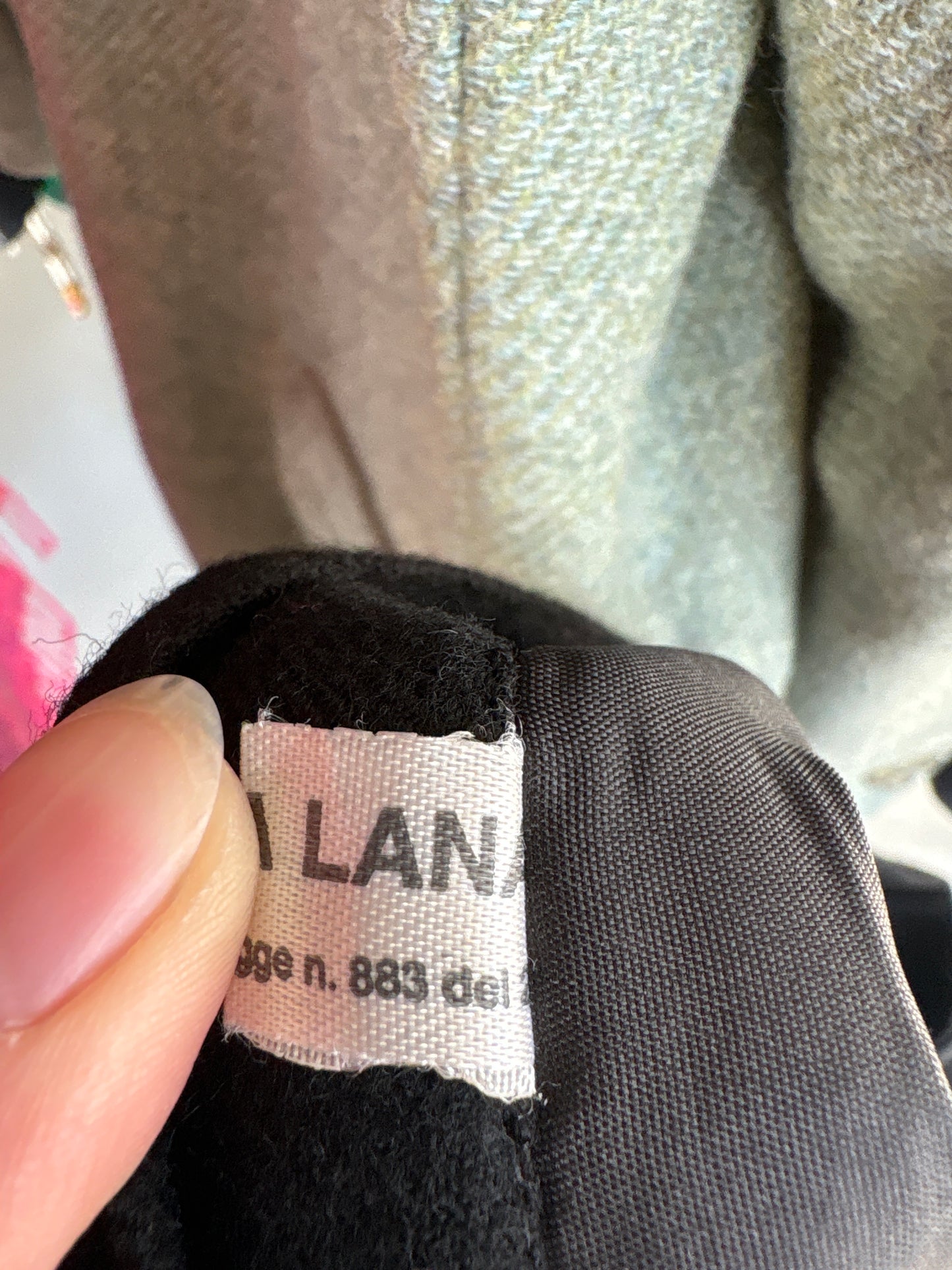 Fustă neagră mini plisată parte peste parte din lana pura extrafina