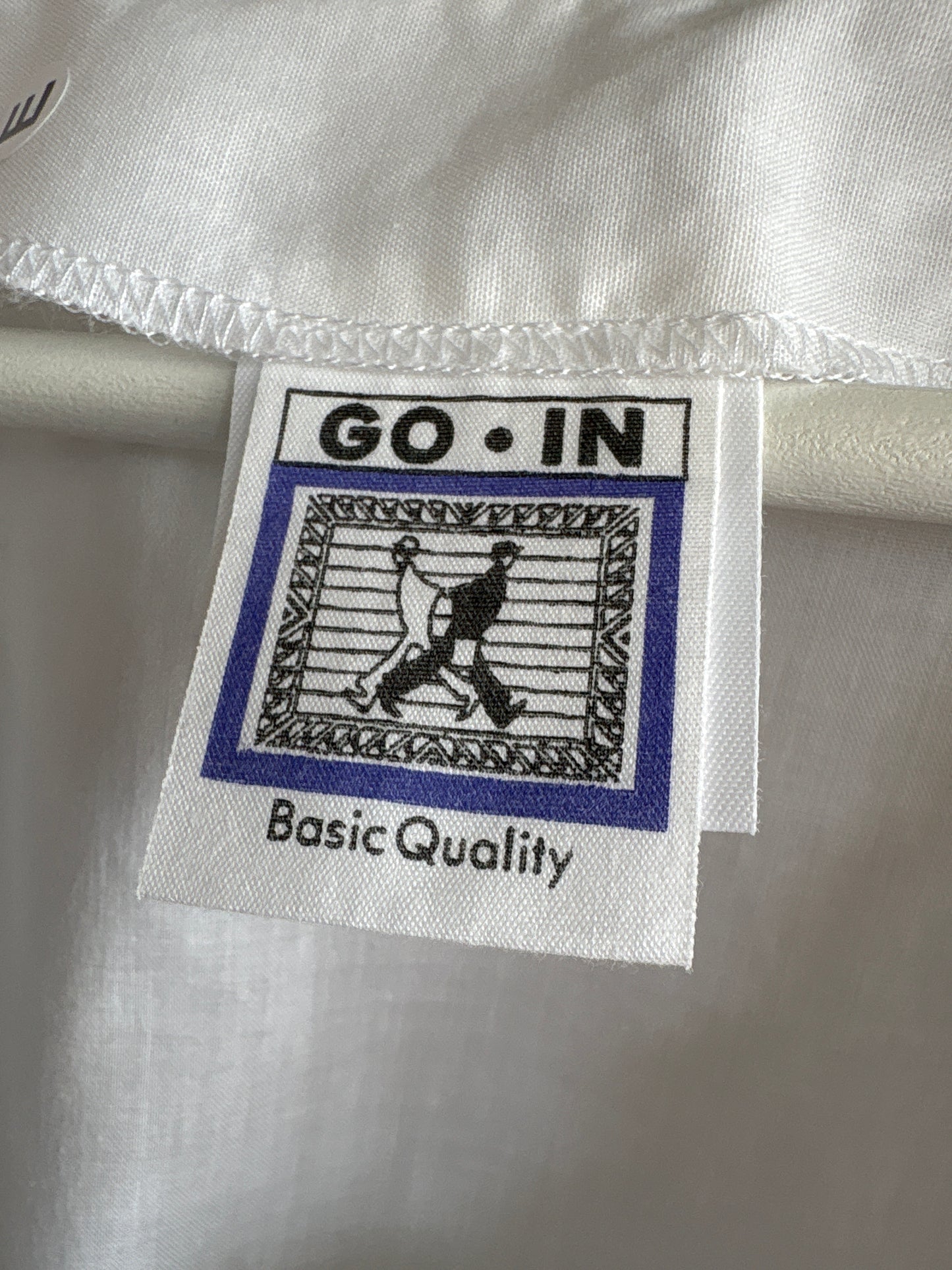 Top din panzica de bumbac integral brodat cu broderie anglaise în croi lejer
