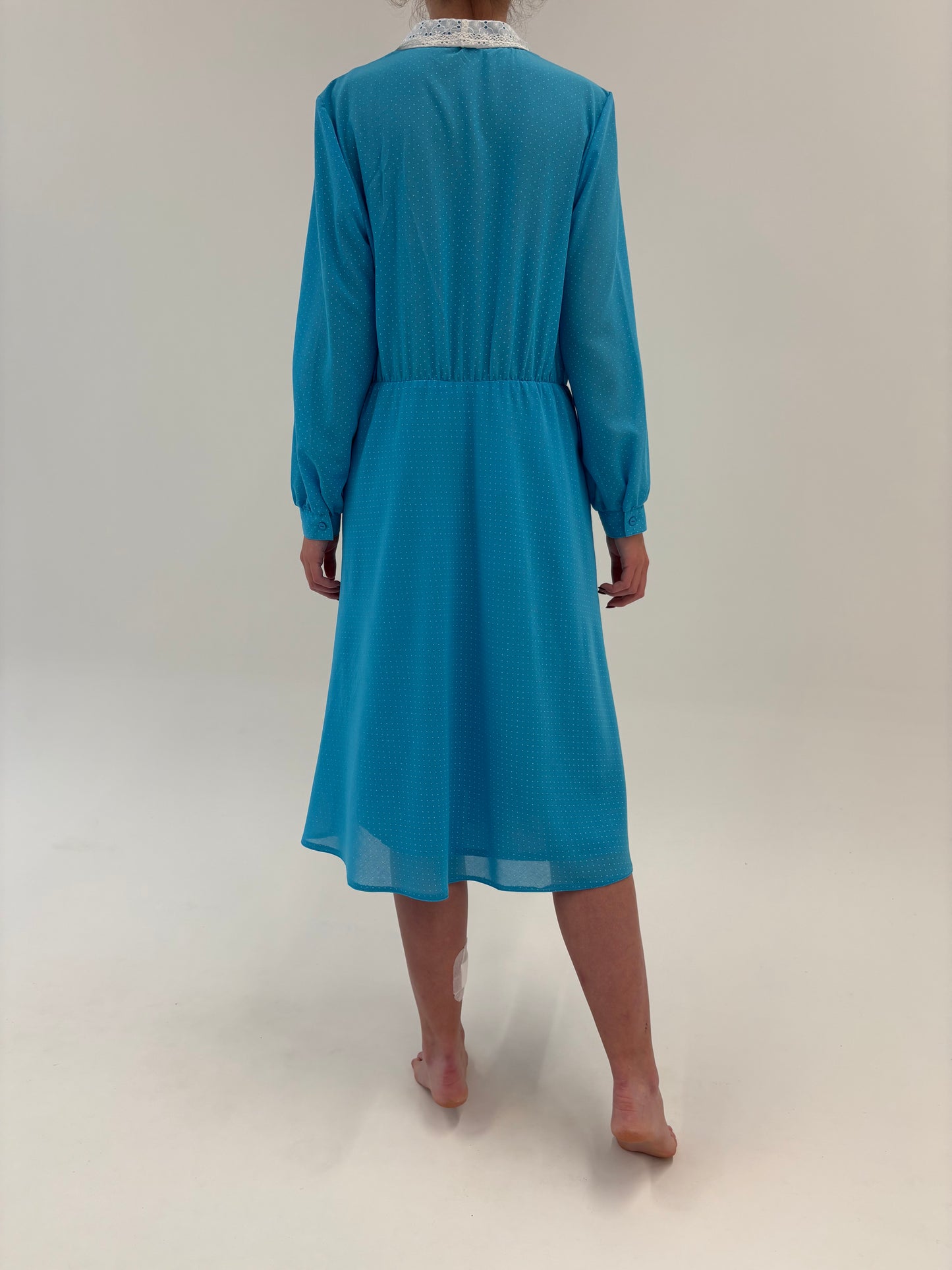 Rochie vintage cu buline, talie marcată și buzunare