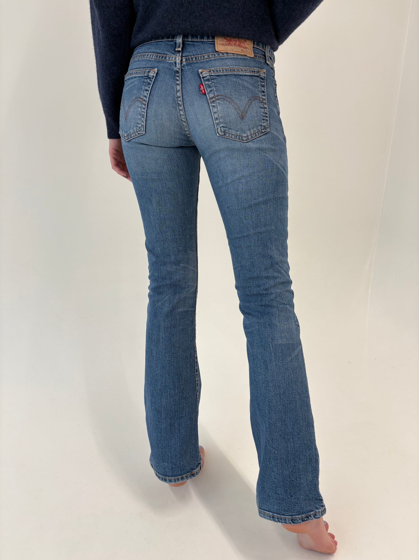 Jeans Levi’s tall bootcut clasic wash cu un touch de elastan