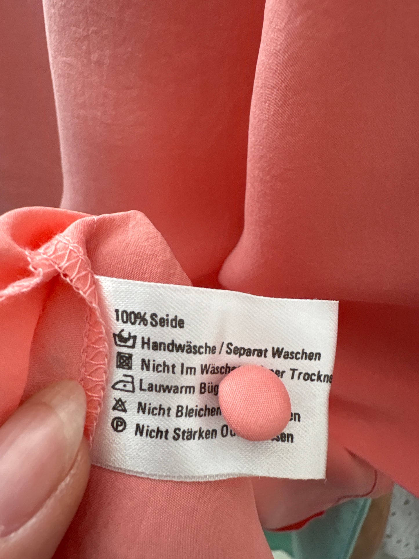 Top salmon Pink cu aplicații manuale perlute în croi lejer minimalist
