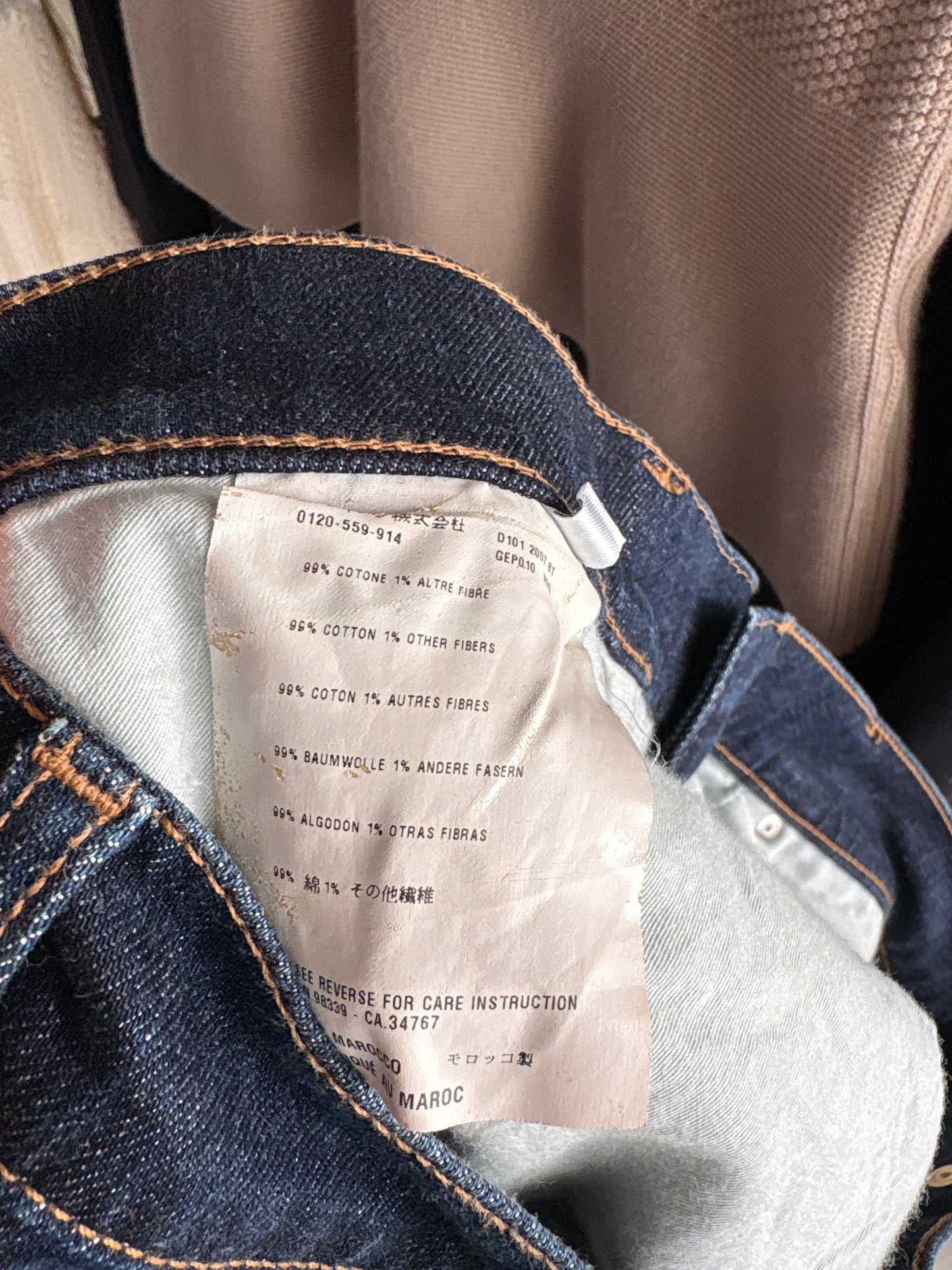 Jeans tall Prada dark wash cu decorațiune metalică detașabilă