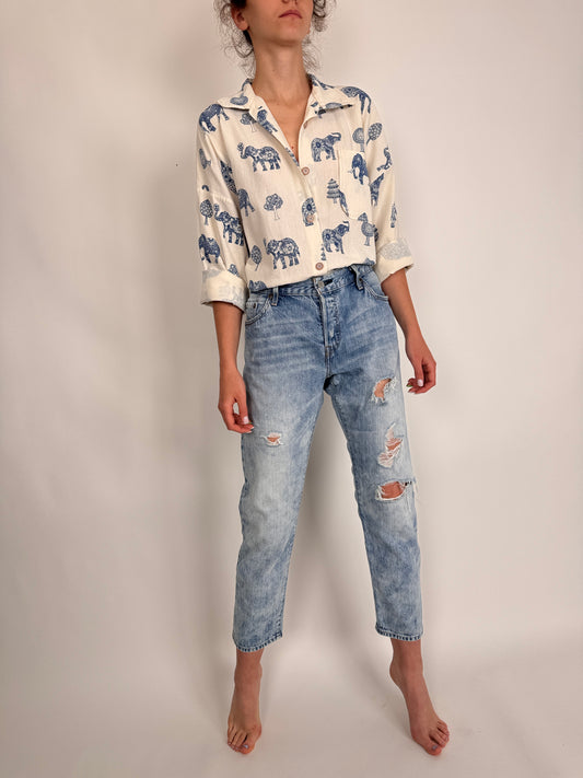 Jeanși Levi’s model 501 lighter wash ripped effect