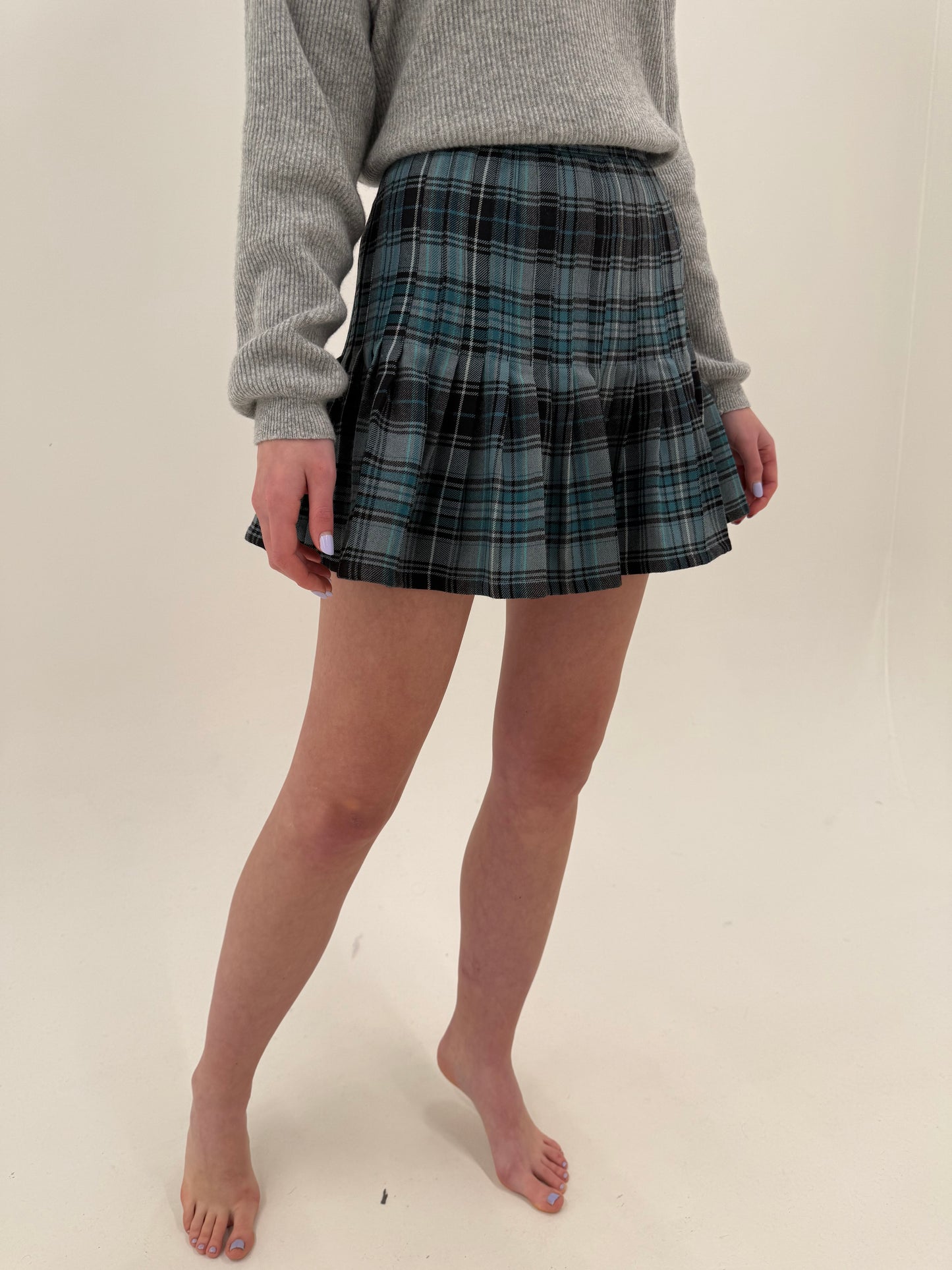 Fustă mini plisată cu talie ultra înaltă din lana extrafina în carouri