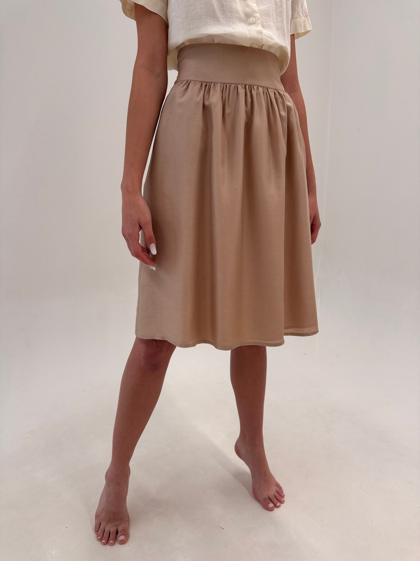 Fustă din mătase naturală dusty Pink cu talie ultra marcată și funda la spate