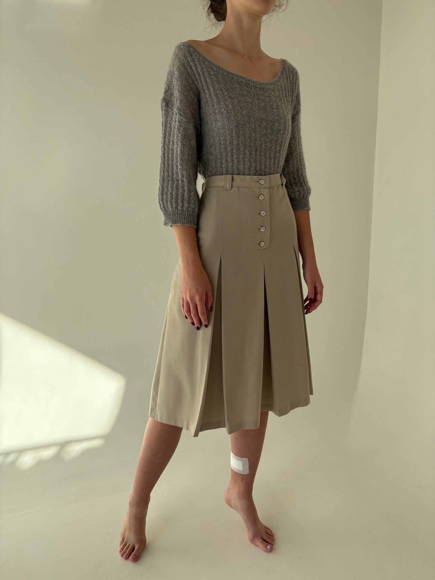 Fustă light nude plisată cu buzunare și talie ultra înaltă din lana extrafina