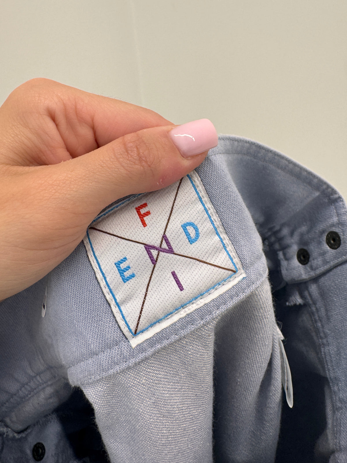 Fustă Fendi vintage din jeans light blue cu talie extrem de marcată midi