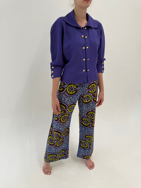 Pantaloni Moschino din pânză de bumbac în culori tari și croi evazat