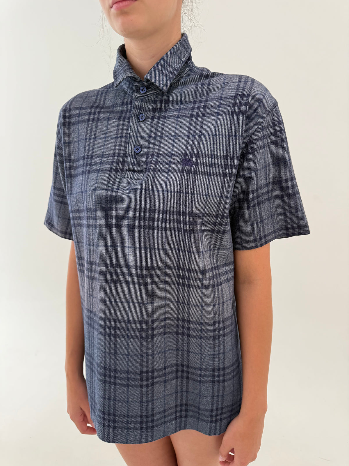 Top polo Burberry din bumbac gros în print specific brandului și nuanțe de jeans blue