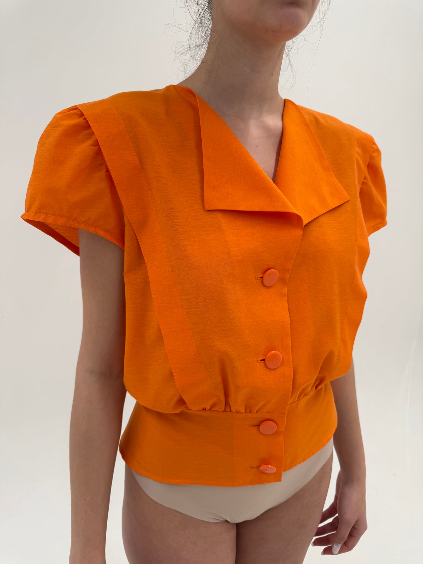 Cămașa vintage în croi elaborat electric orange din panzica perlata