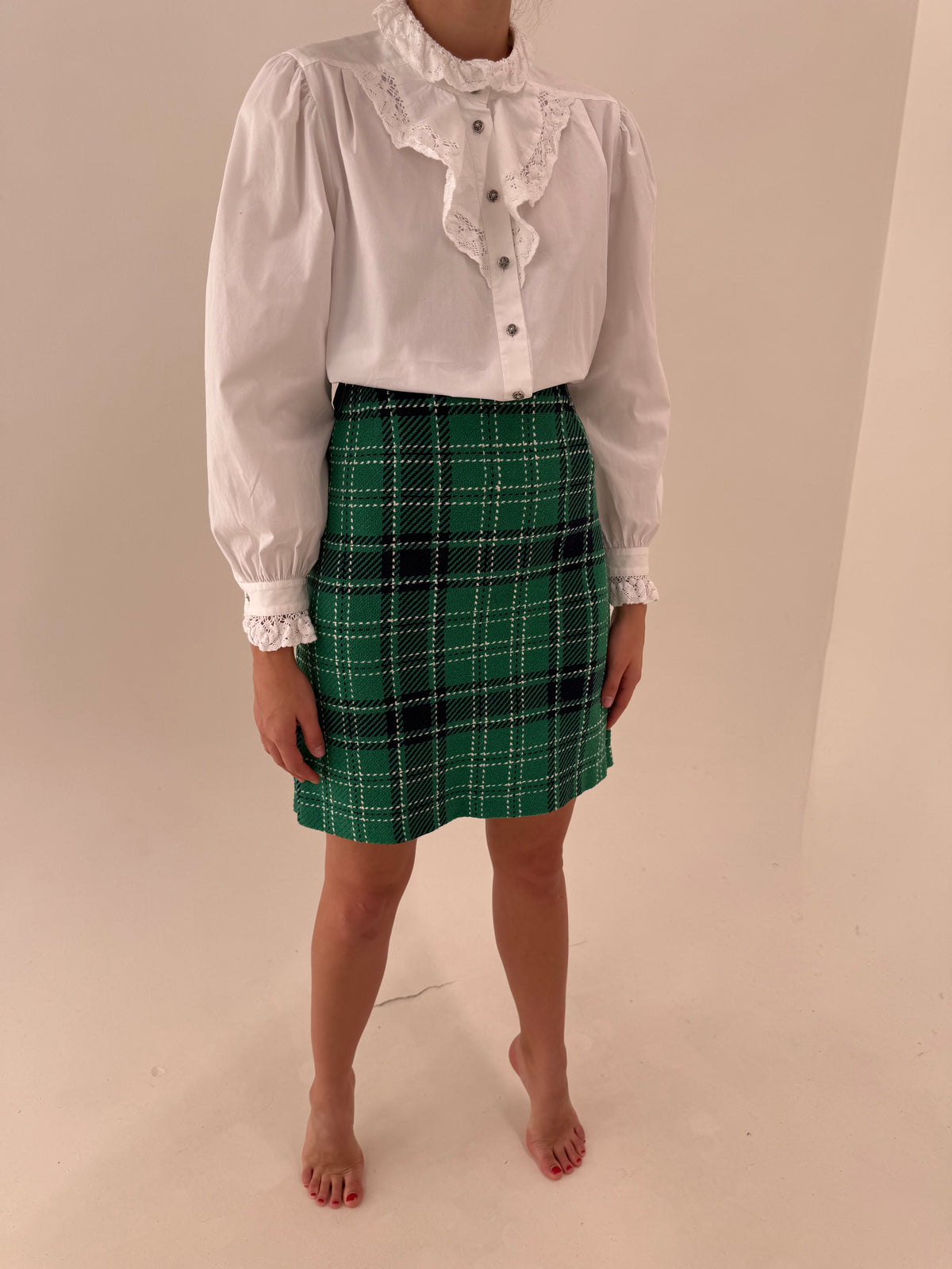 Fustă Madeleine în carouri din tweed de bumbac în croi clasic