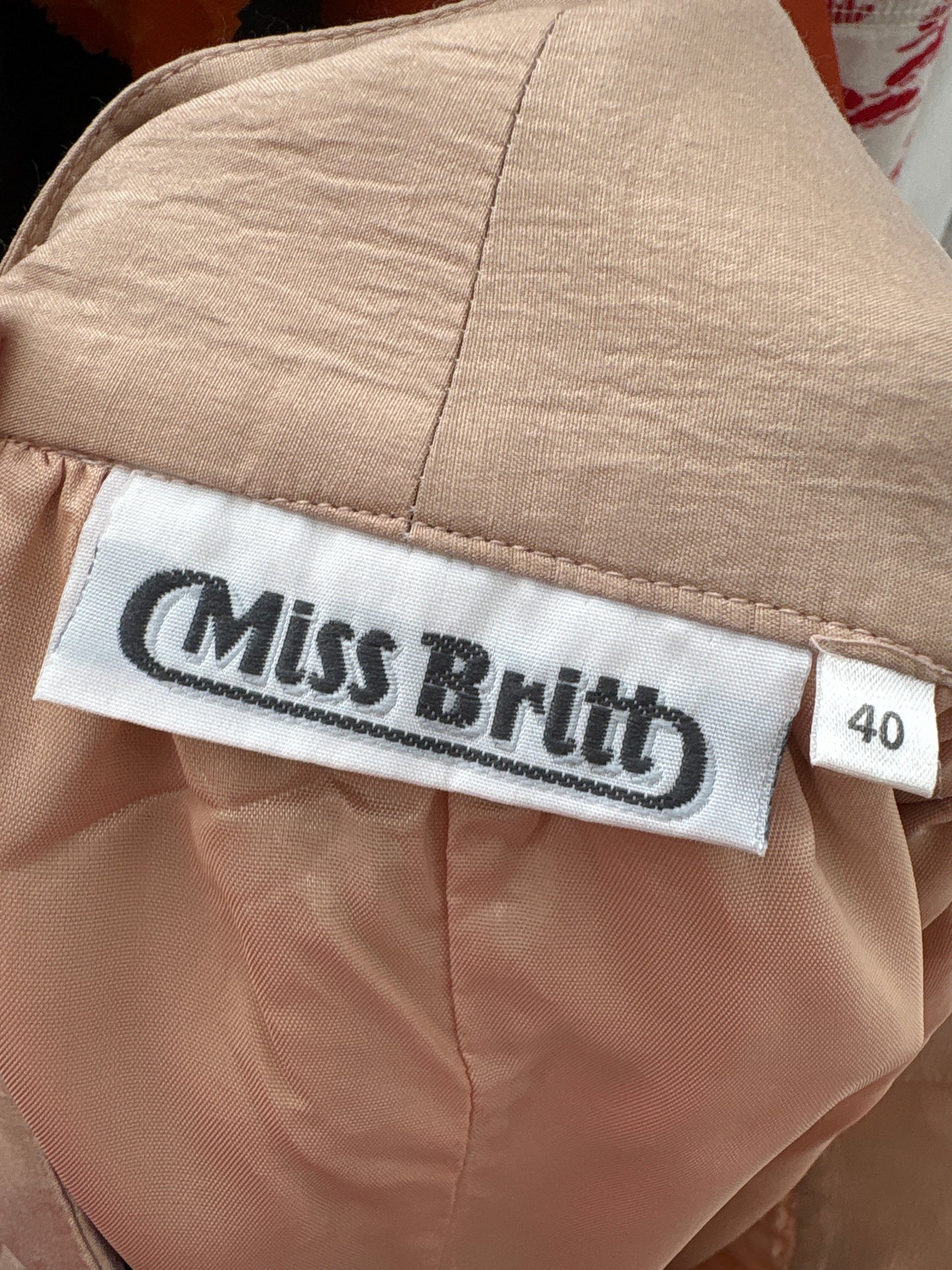 Fustă din mătase naturală dusty Pink cu talie ultra marcată și funda la spate
