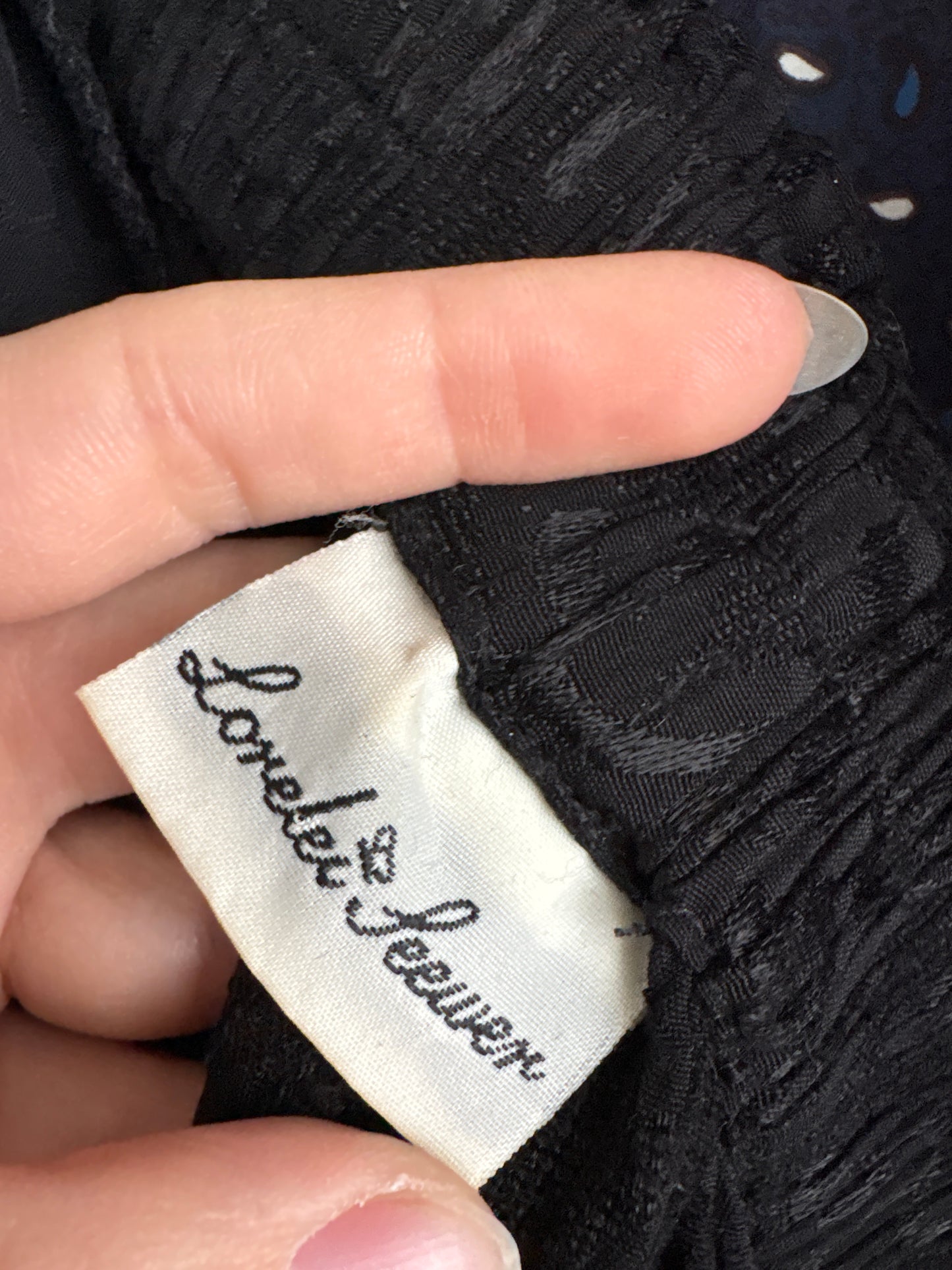 Pantaloni negri spre palazzo cu talie ultra înaltă ușor satinați și texturati