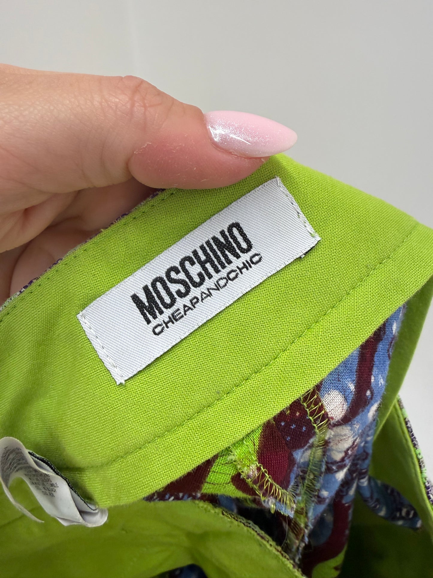 Pantaloni Moschino din pânză de bumbac în culori tari și croi evazat