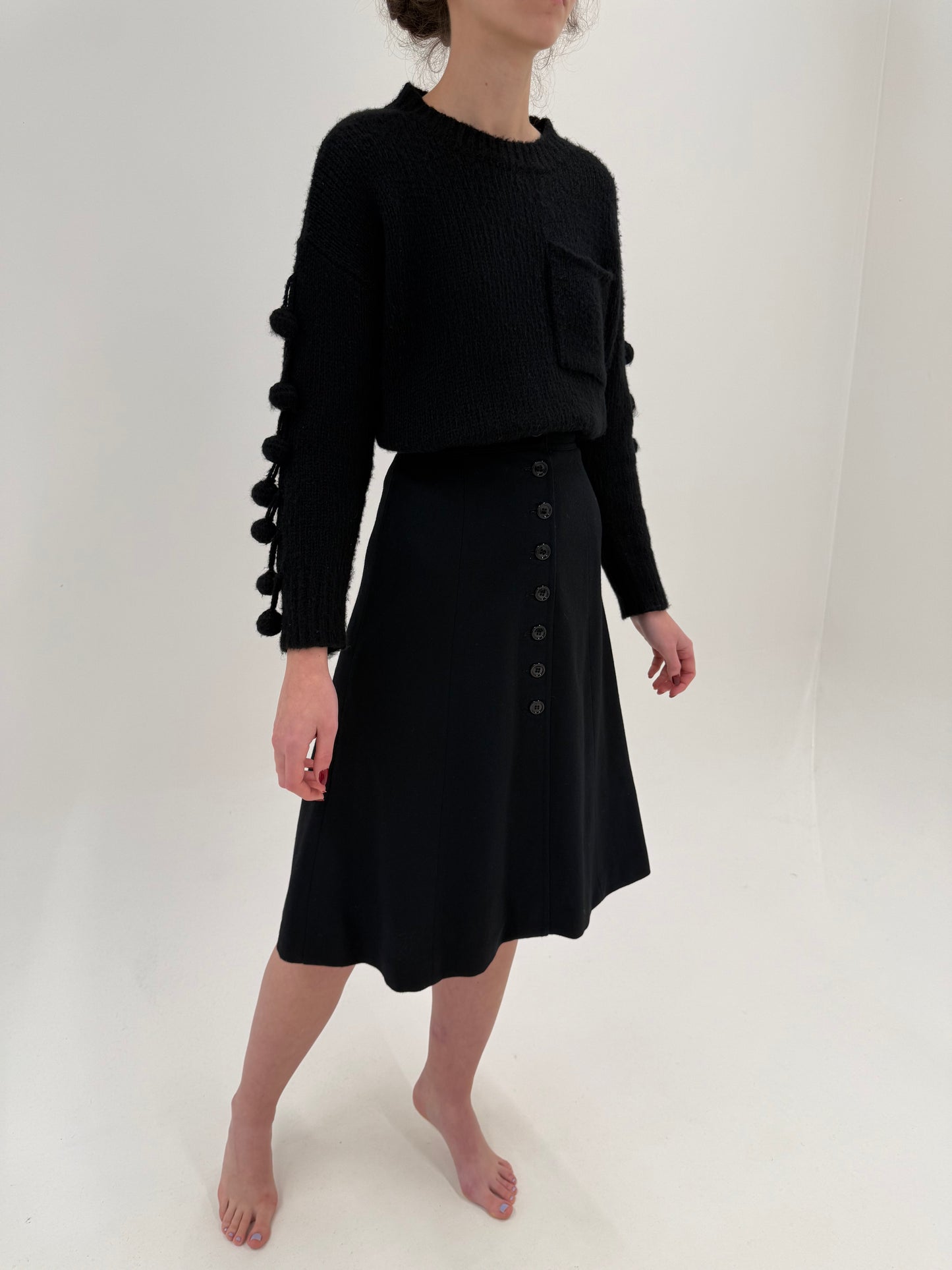 Fustă neagră în croi A-line din lana extrafina cu talie ultra înaltă