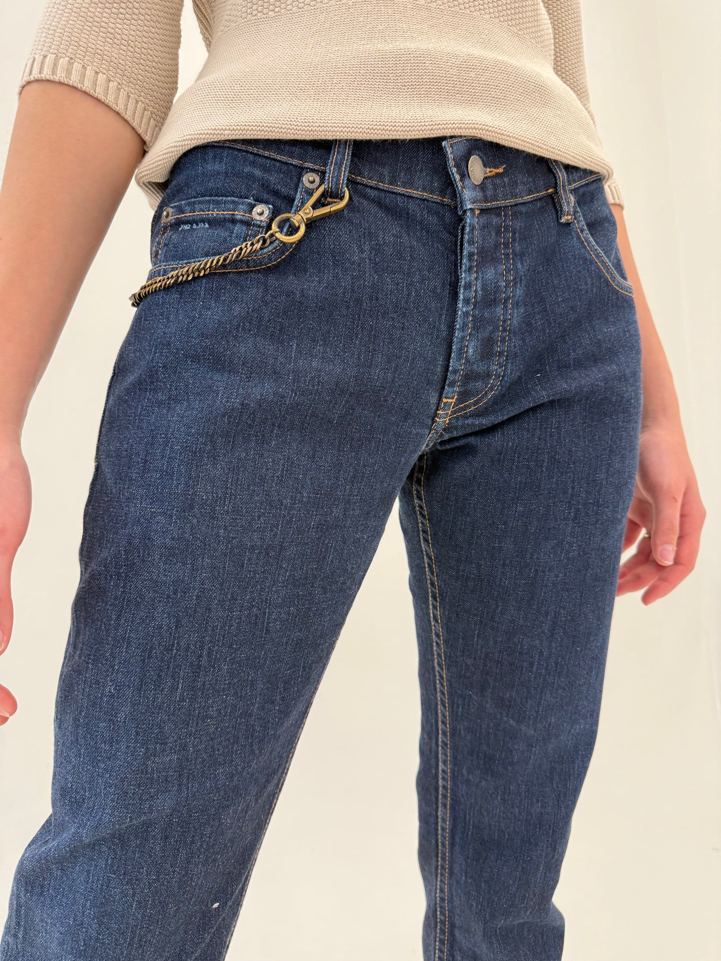 Jeans tall Prada dark wash cu decorațiune metalică detașabilă
