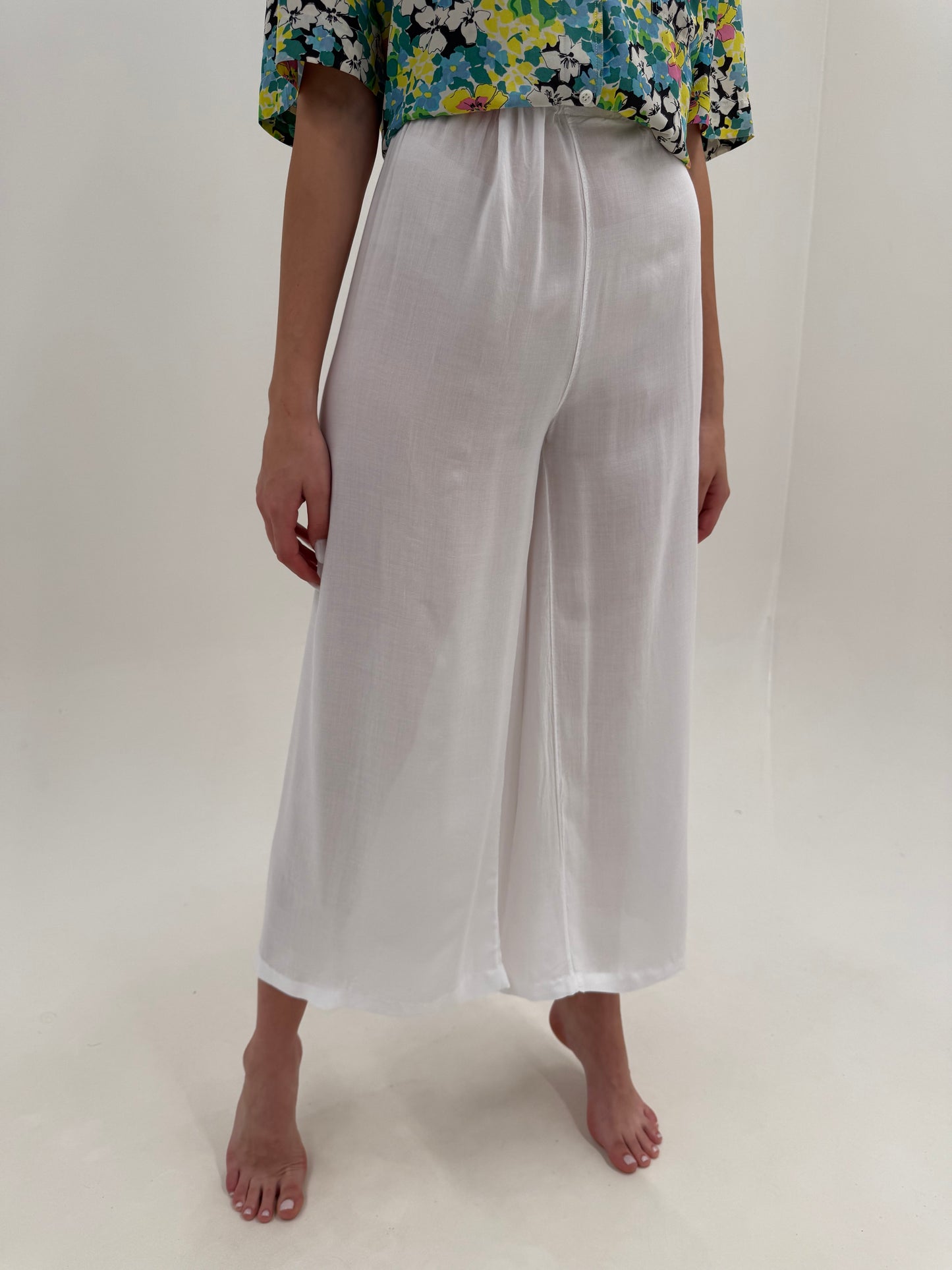 Pantaloni palazzo super vaporoși albi cu talie ultra înaltă ușor satinați