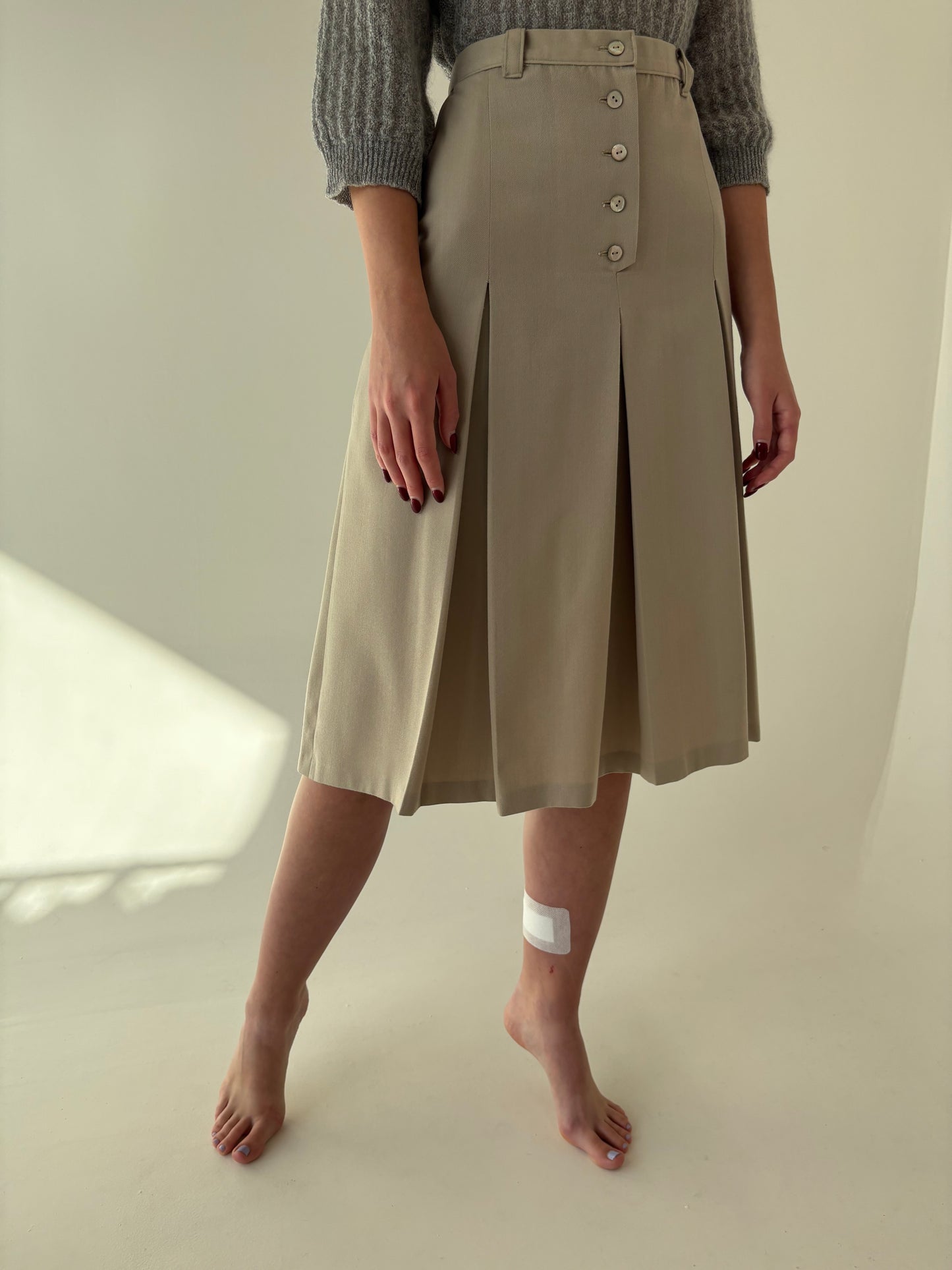 Fustă light nude plisată cu buzunare și talie ultra înaltă din lana extrafina