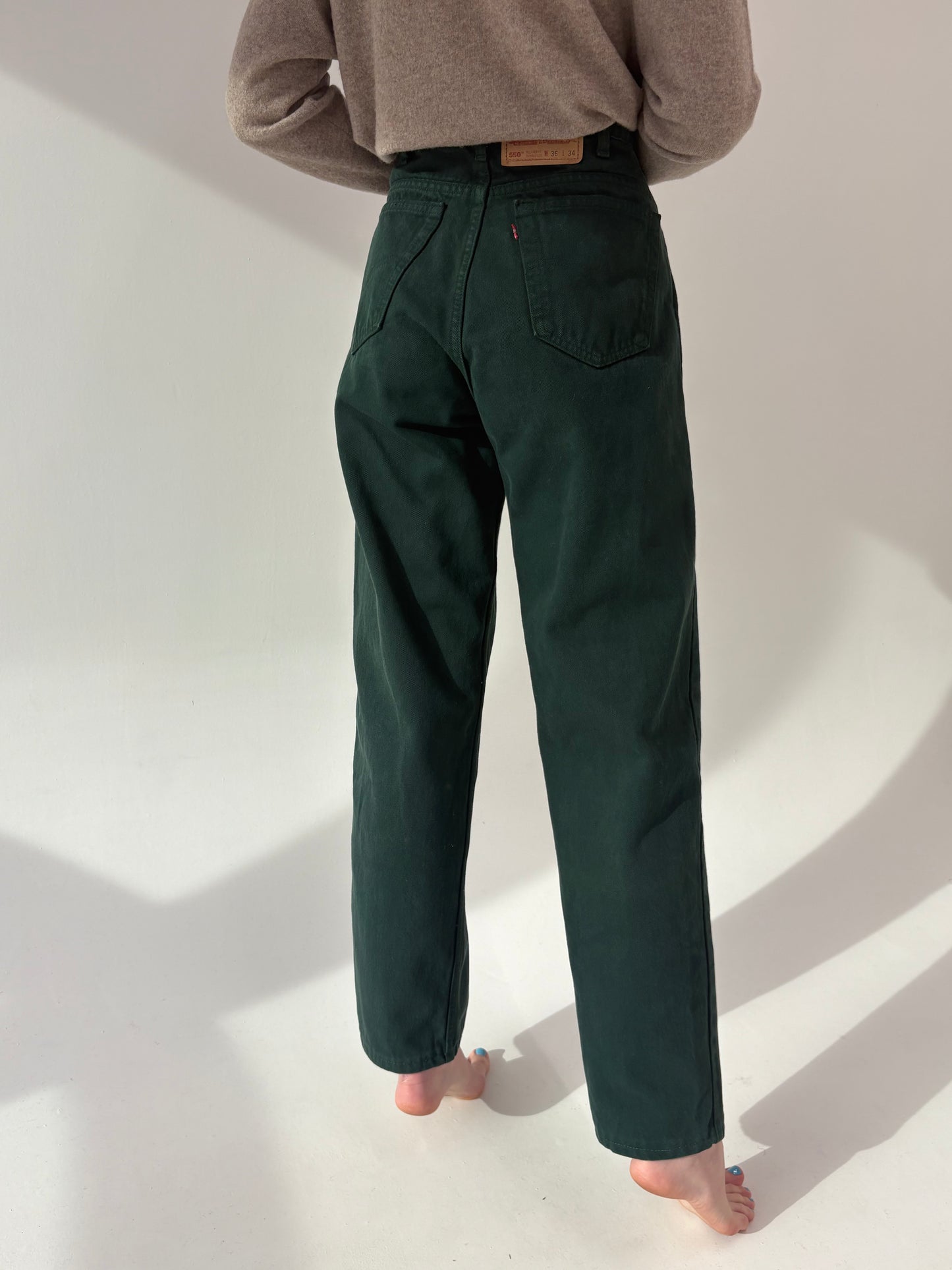 Jeans vintage Levi’s model 550 tall cu talie ultra înaltă forest green
