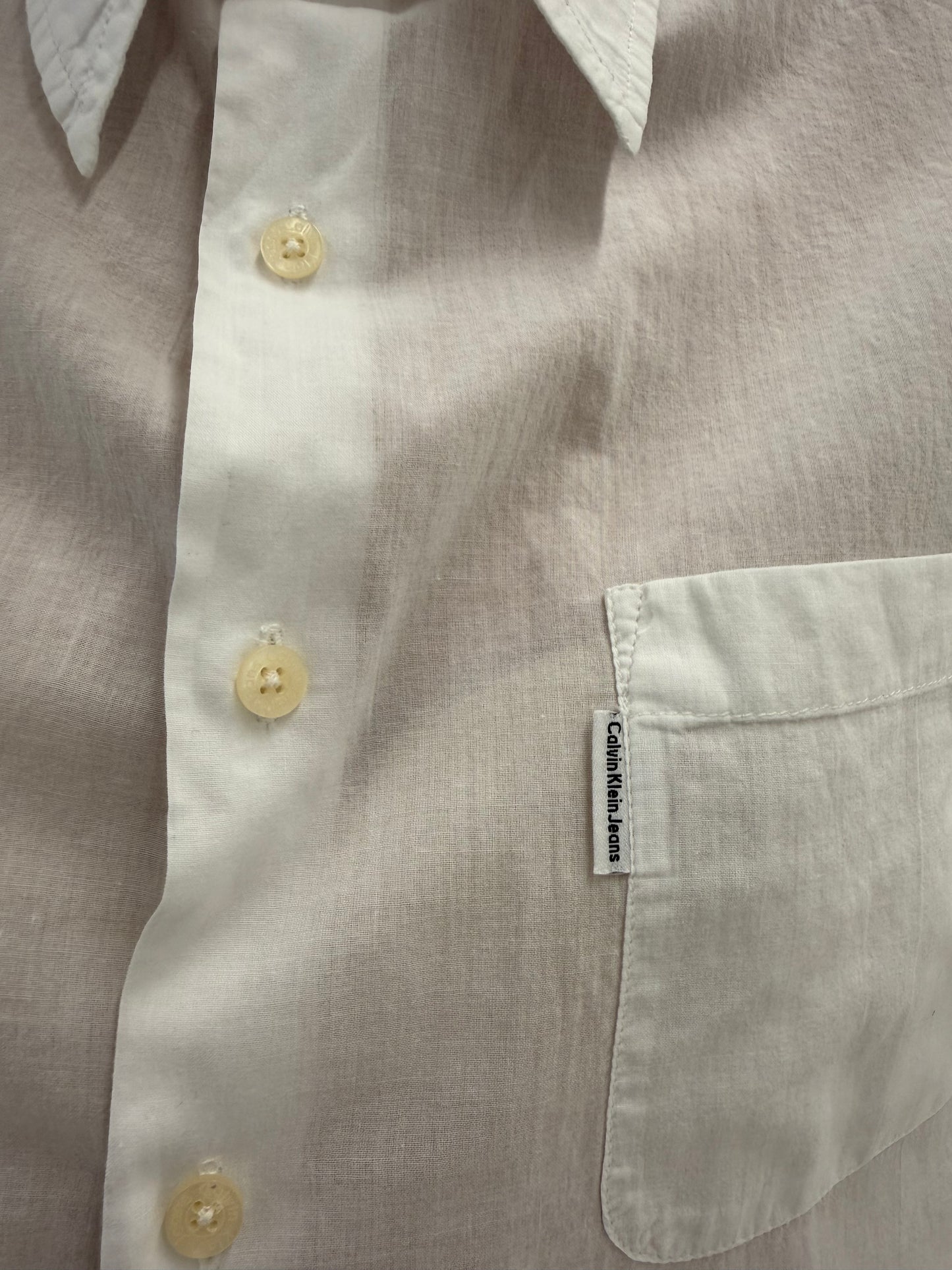 Cămașa vintage de brand din panzica de bumbac în croi asimetric retro modern