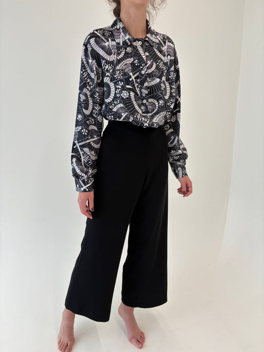 Pantaloni palazzo negri de la zi la seară