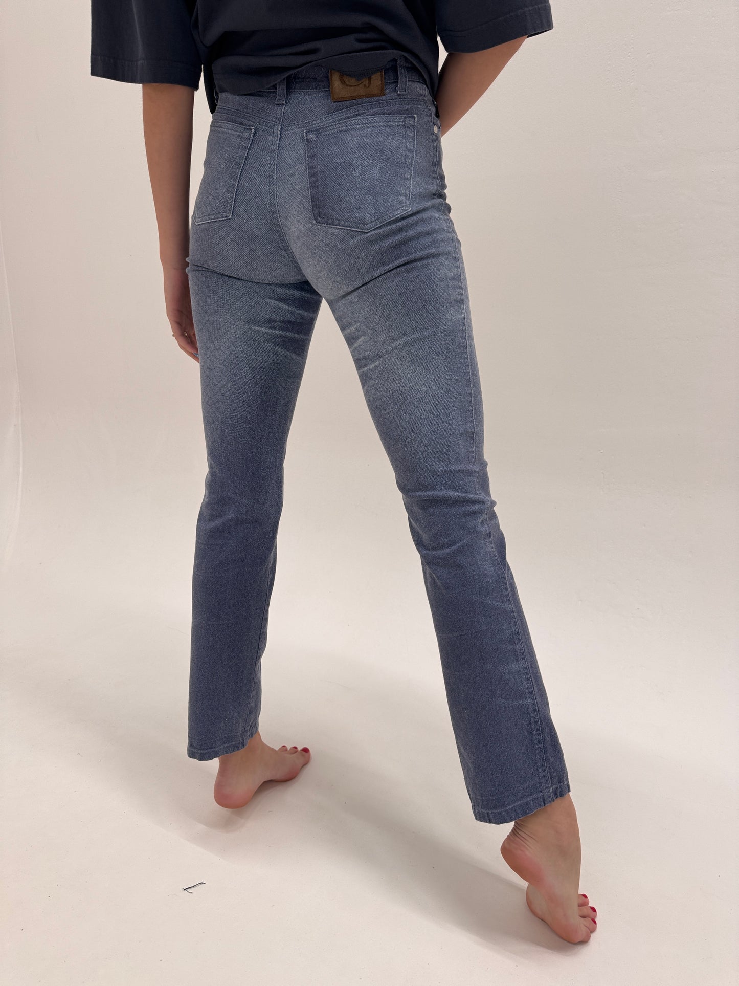 Jeans iconic Roberto Cavalli cu animal print discret snake specific brandului