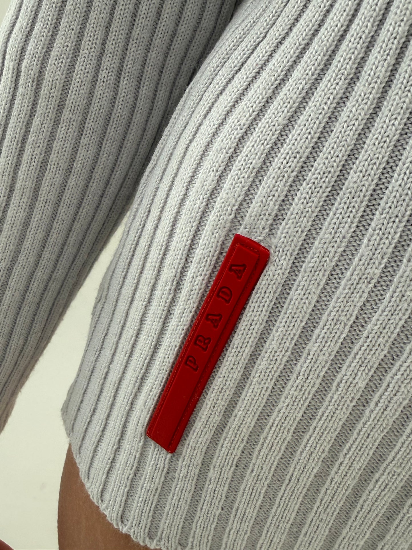 Quarter zip Prada very light blue cu influențe sport