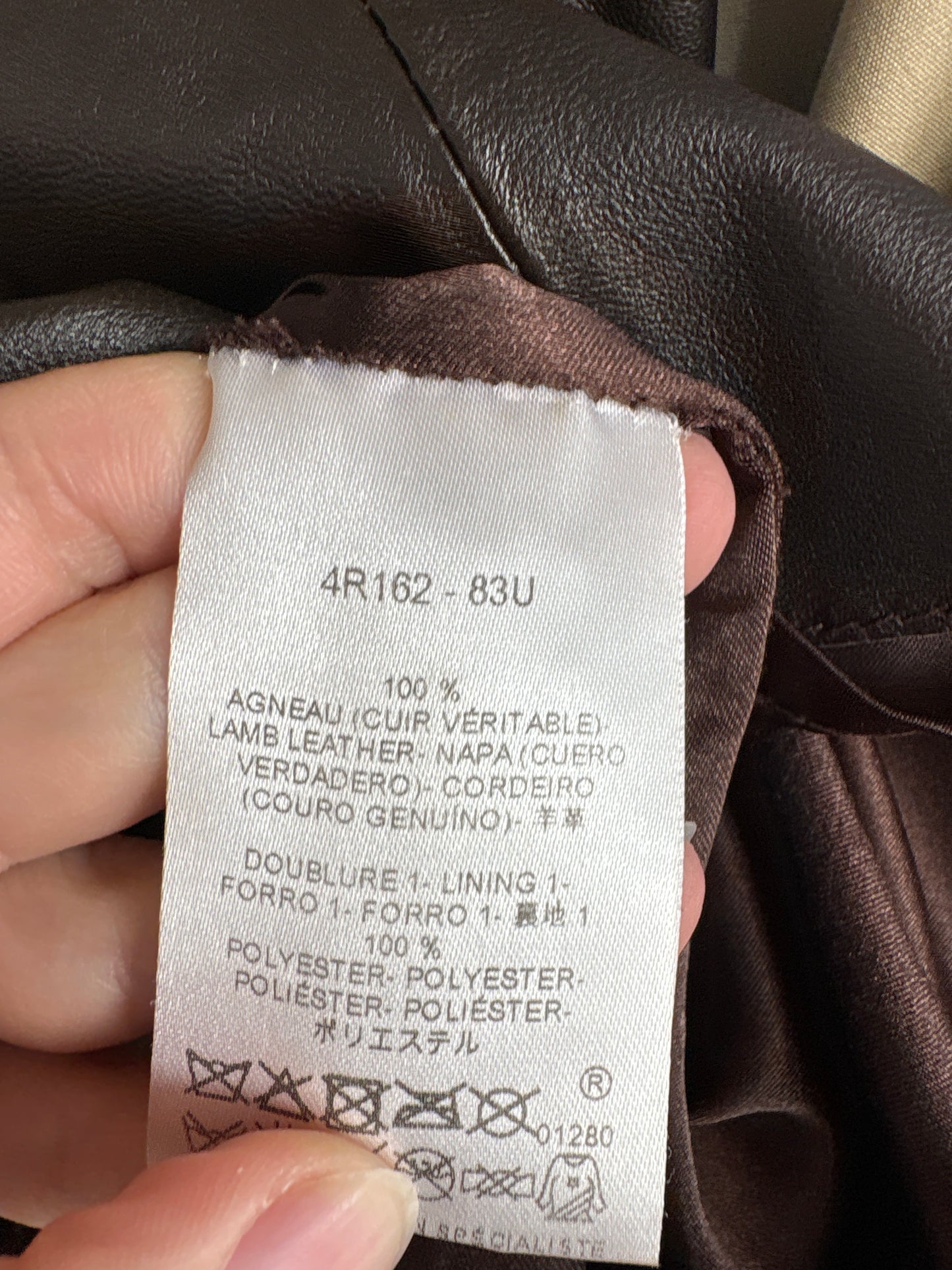 Fustă din piele naturală dark chocolate brown cu buzunare în croi ușor A-line