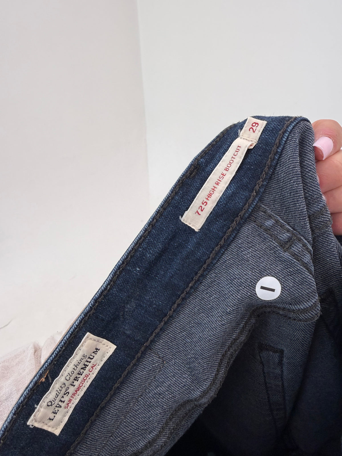 Jeans Levi’s high rise bootcut dark wash tall modelatori din bumbac și lyocel