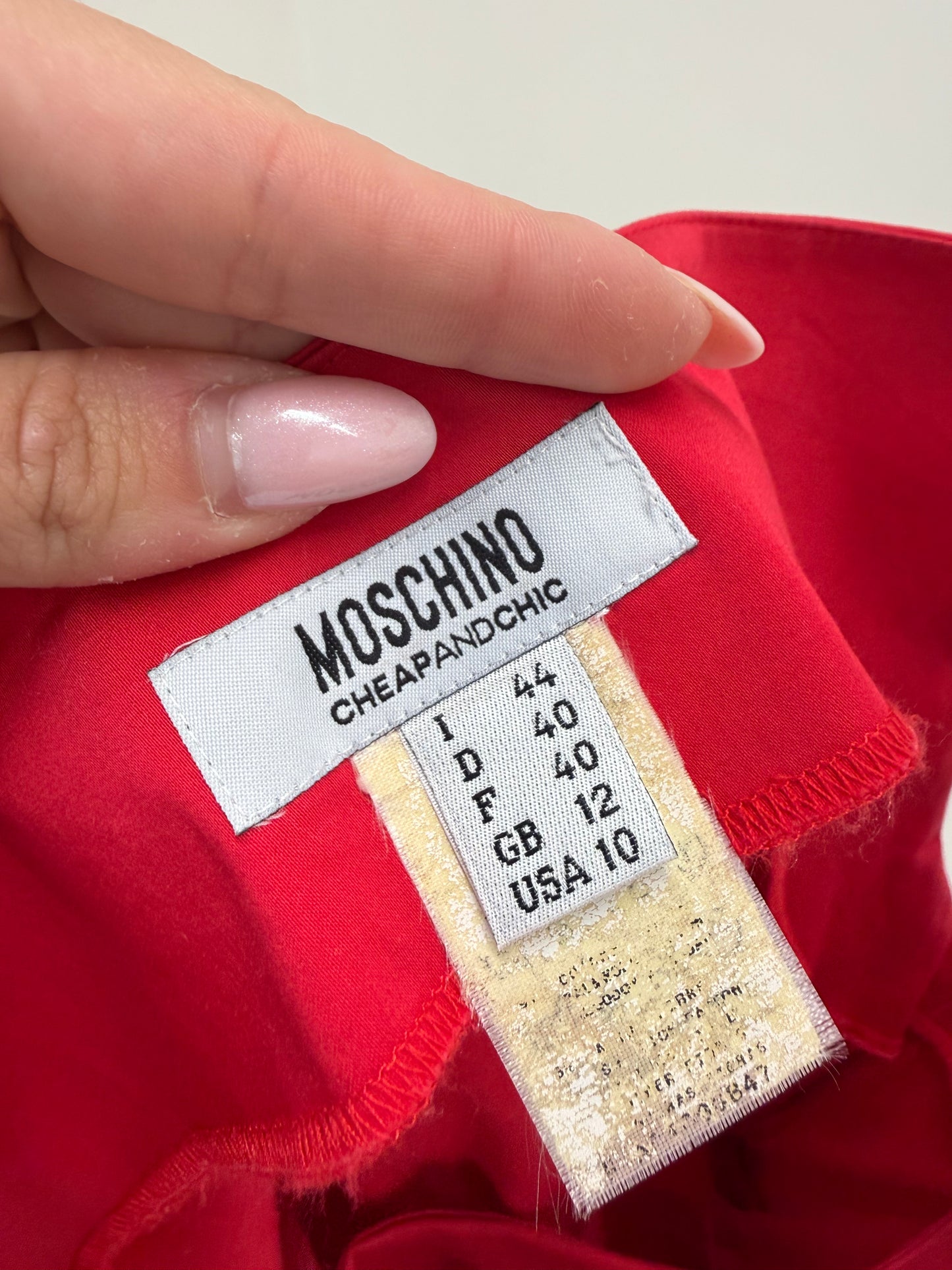 Rochie Moschino cu talie ultra marcată în croi asimetric și drapaj din poplin