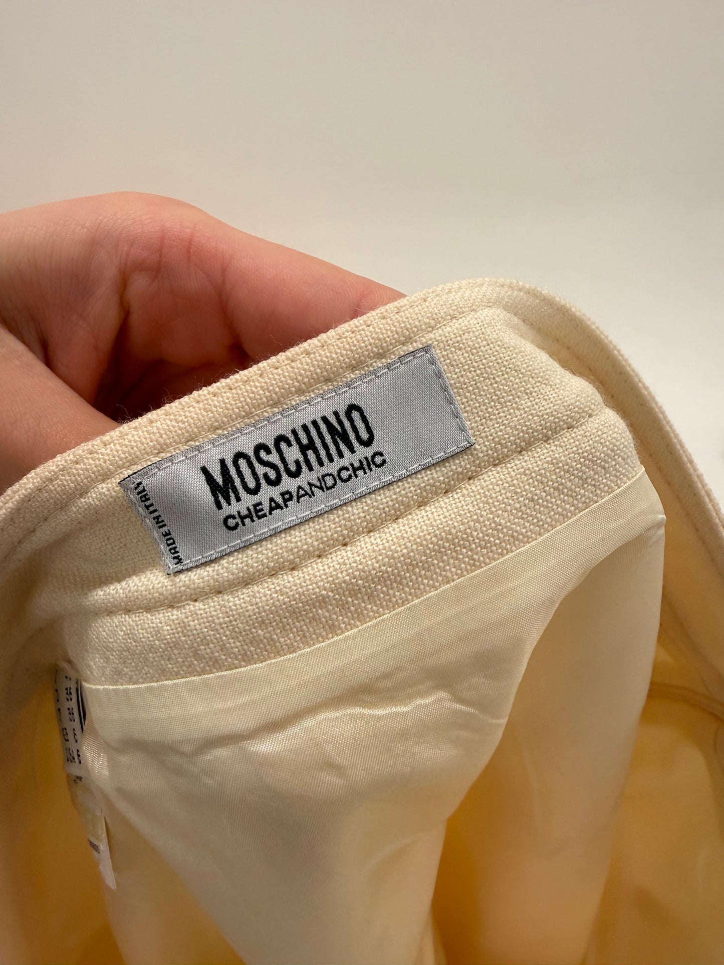 Fustă luxury Moschino din worsted wool cu tinuta și talie ultra înaltă cu pliseuri